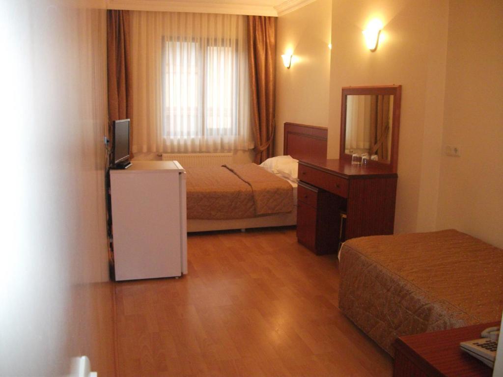 Emos Hotel Истанбул Стая снимка
