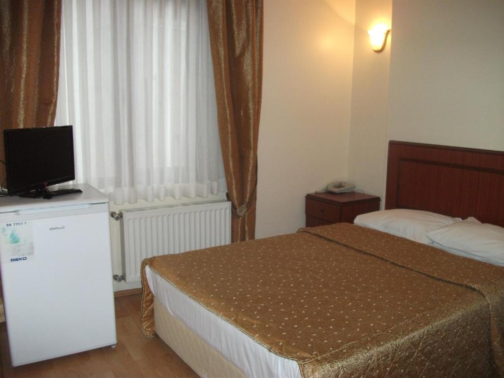 Emos Hotel Истанбул Стая снимка